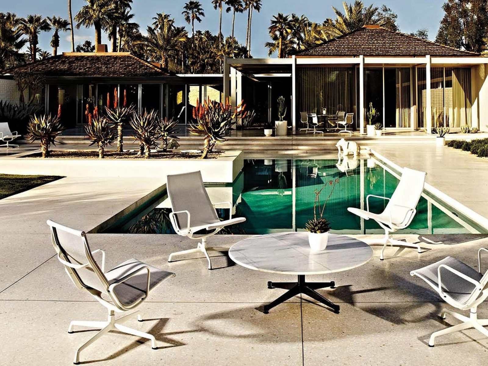 Eames round contract base outdoor table charles and ray eames herman miller 5